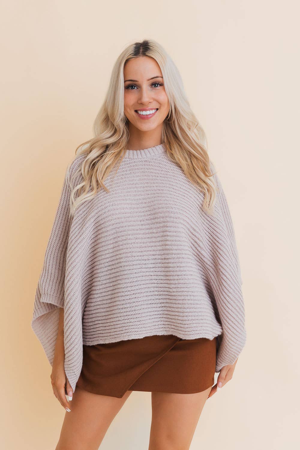 Metropolitan Elegance Rib-Knit Arm Poncho